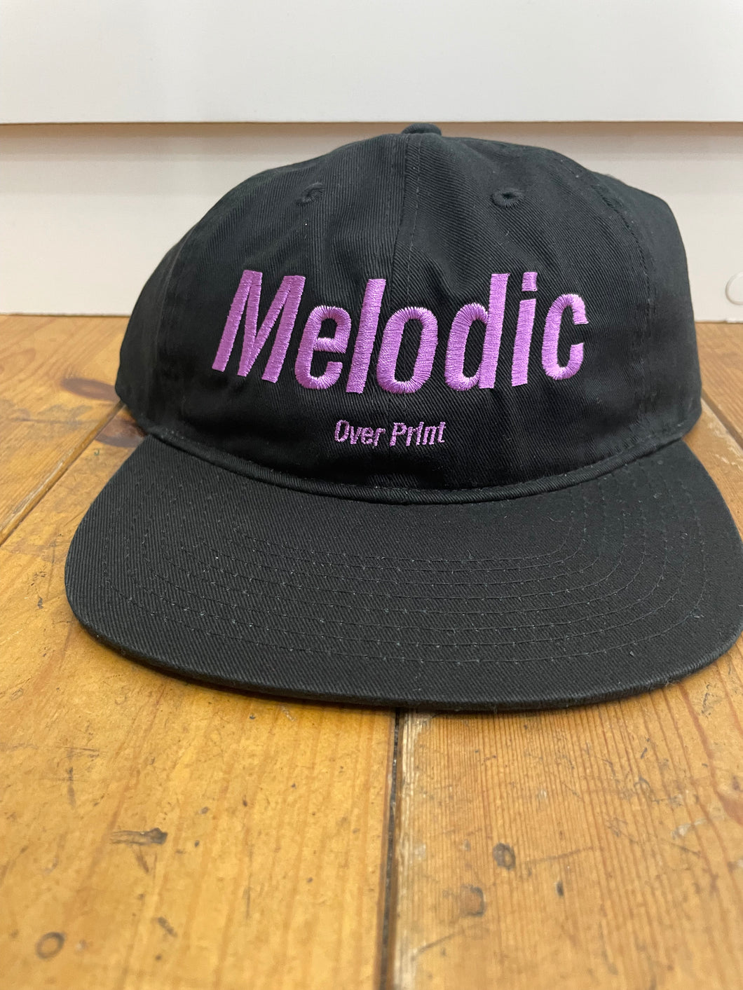 over print  Melodic CAP